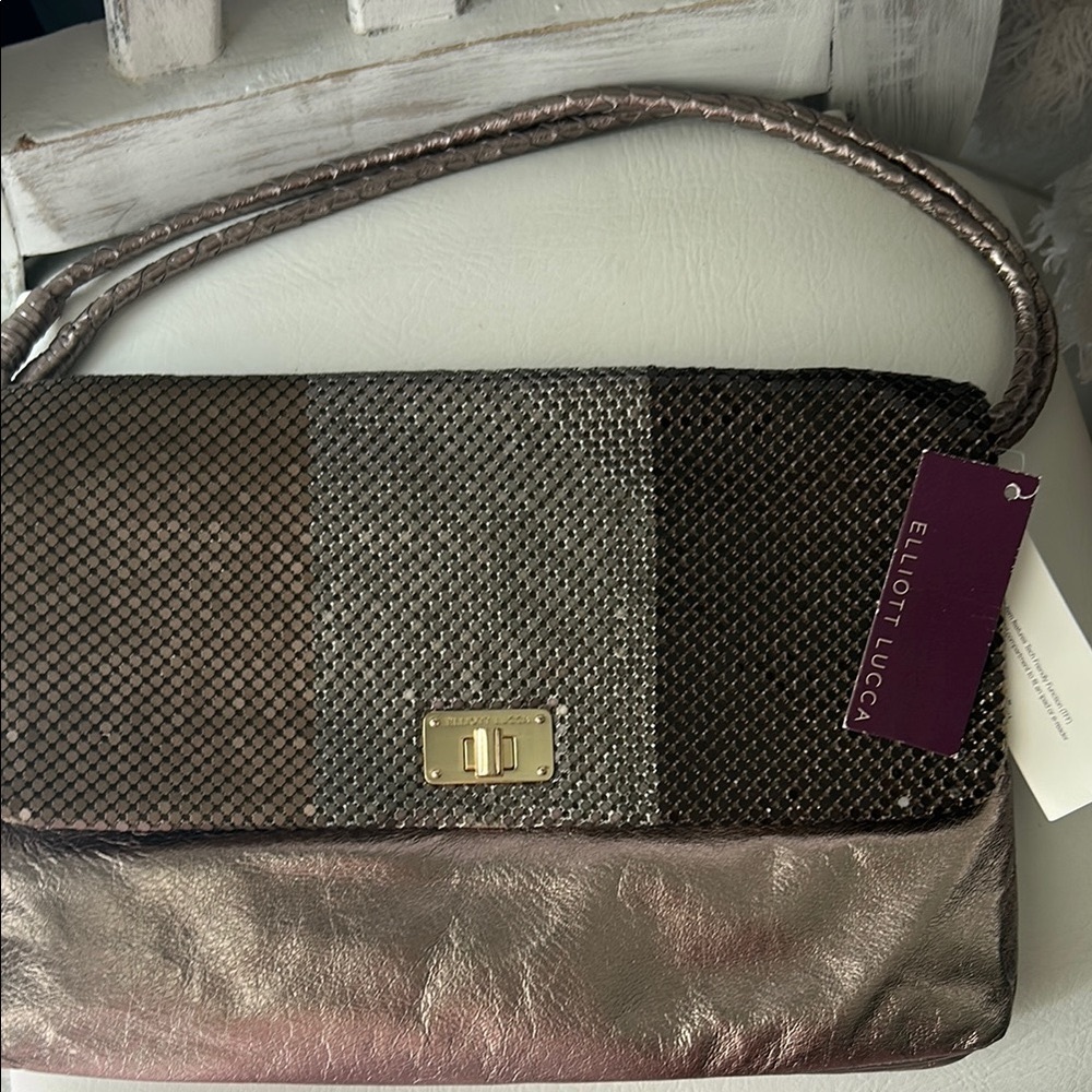 Elliott Lucca Silver Clutch with Metallic Accents